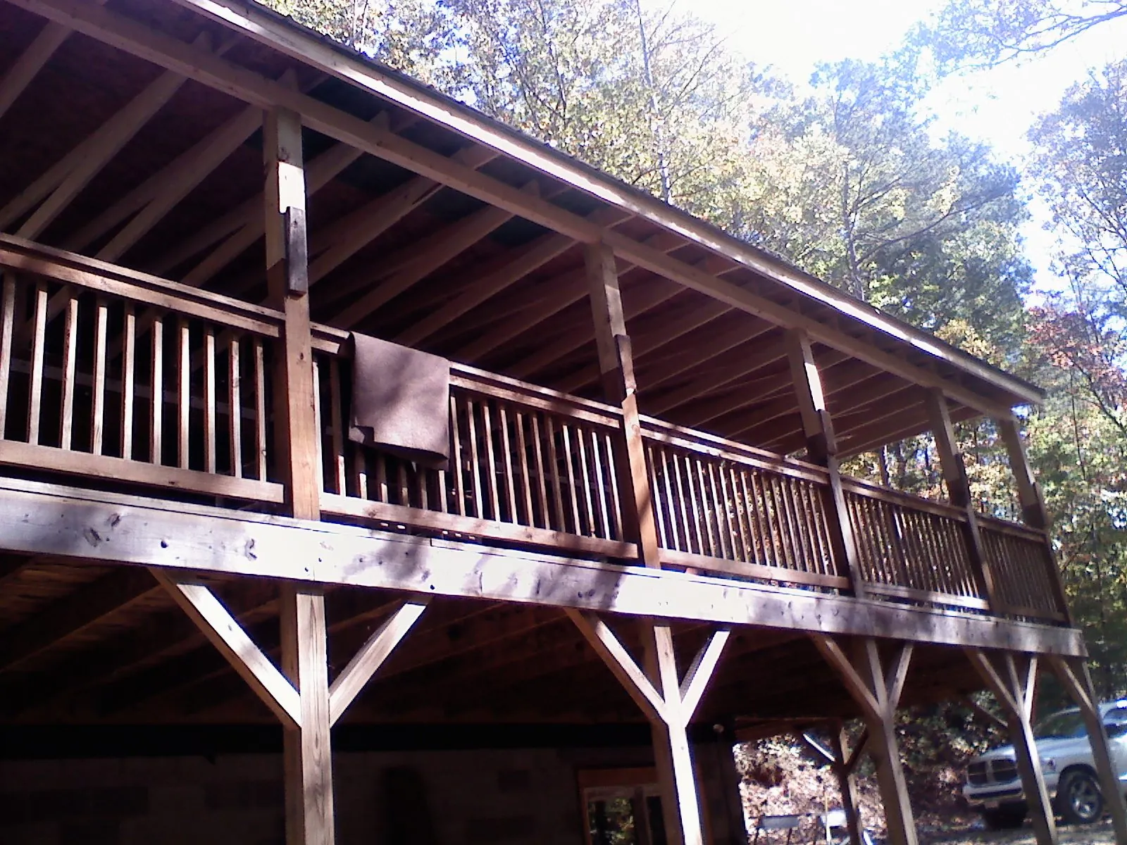Timber framing under a new elevated porch and deck — Roof Leak Repair in Drakesville by Roofing Brothers